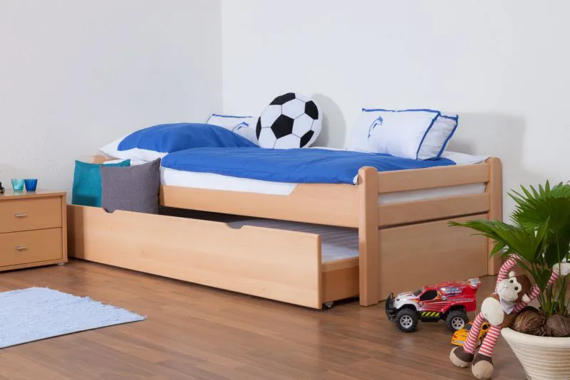 Kinderbett / Jugendbett "Easy Premium Line" K1/1h inkl. 2. Liegeplatz und 2 Abdeckblenden, 90 x 200 cm Buche Vollholz massiv Natur